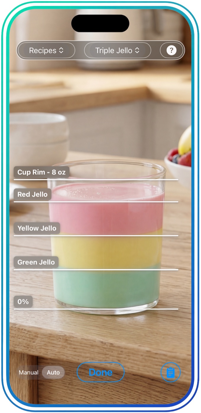 A Triple Jello recipe with green, yellow and red layer lines marked on a glass.